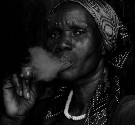 Shilluk-woman-smoking-pipe-South-Sudan-19x21-1